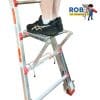 Person standing on aluminum ladder step.