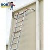 Ladder attached to a building wall.