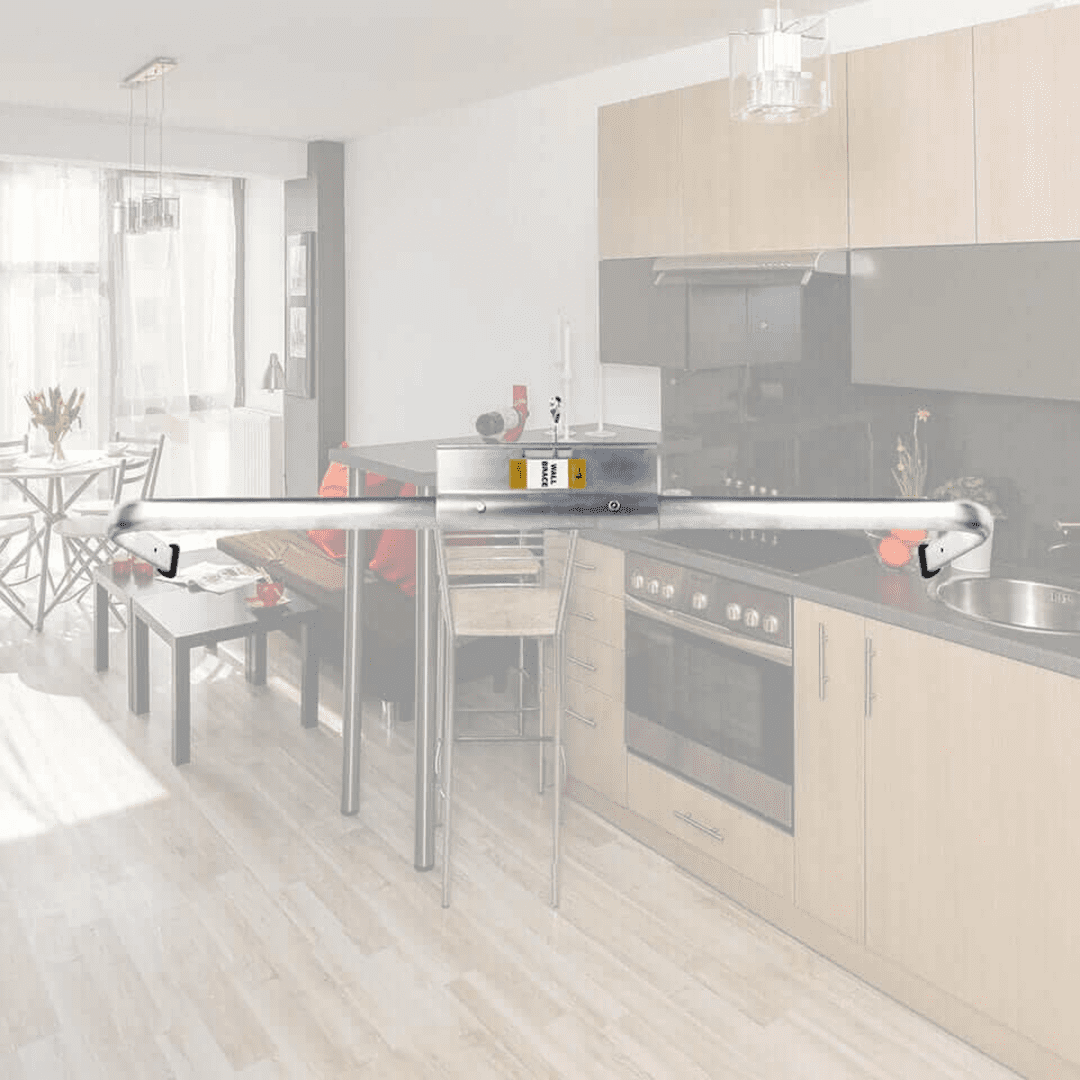 Kitchen with a metal safety gate installed.