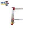 Clamp with red handles and yellow grip.