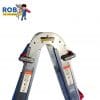 Folding step ladder with safety labels.